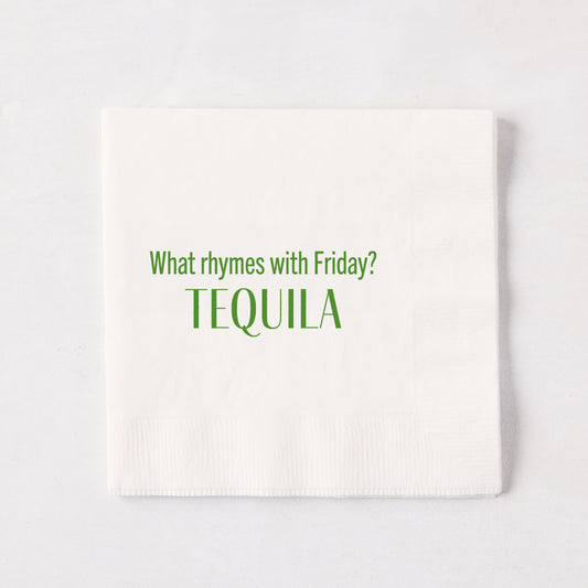 White 5.5" square paper cocktail napkin with "What rhymes with Friday? TEQUILA" in green text.