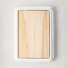 White ceramic handled cutting board with light oak wood surface, 18"L x 13"W.