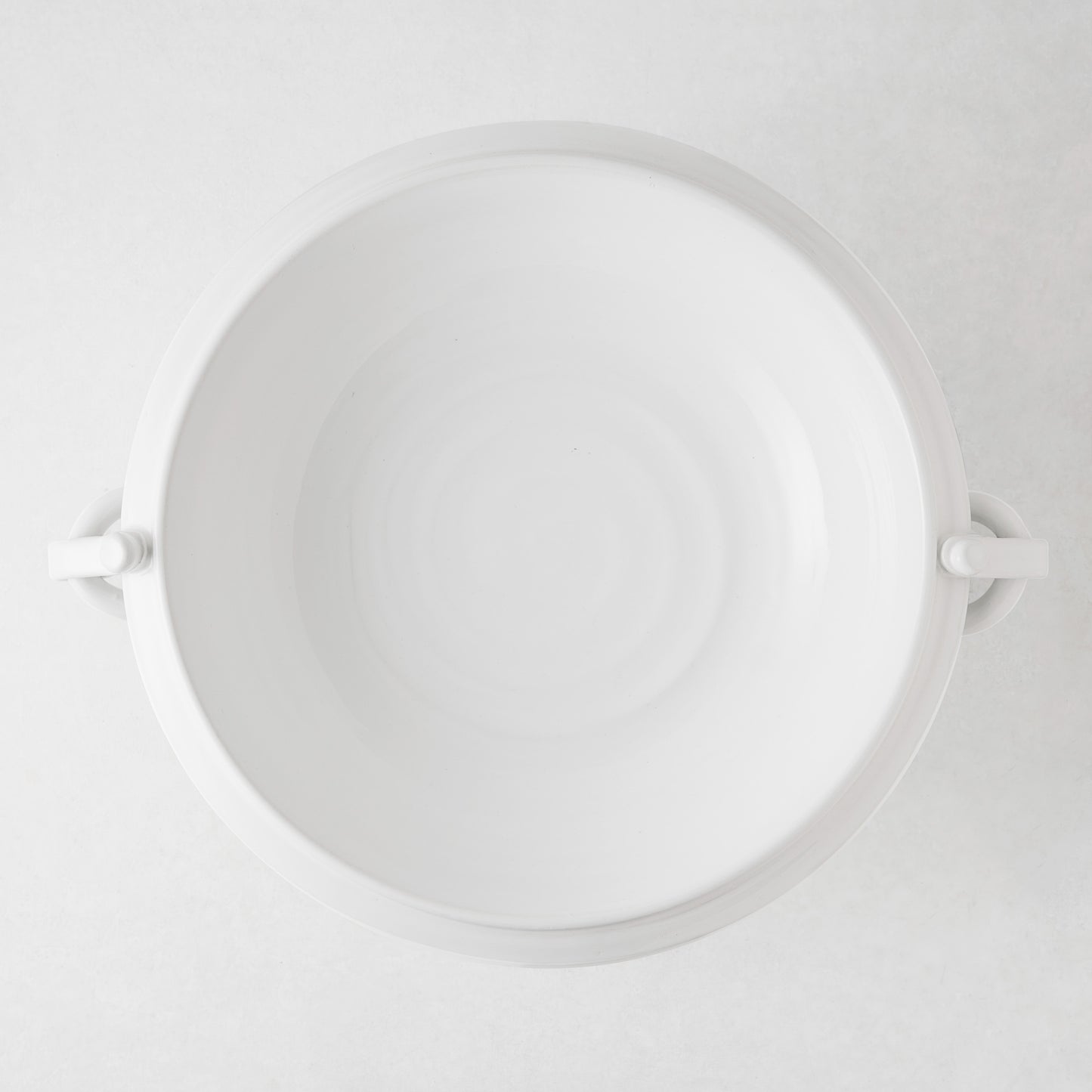White ceramic pedestal fruit bowl, 17"Dia, with ring handles and wide rim.