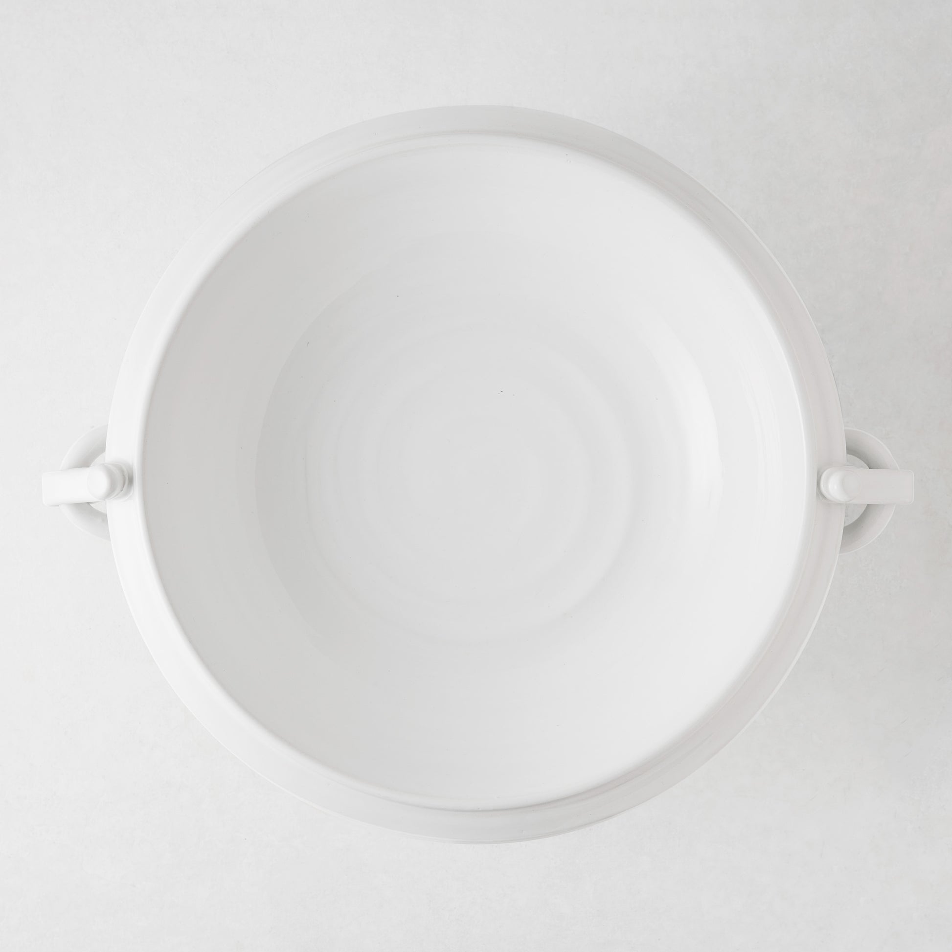 White ceramic pedestal fruit bowl, 17"Dia, with ring handles and wide rim.