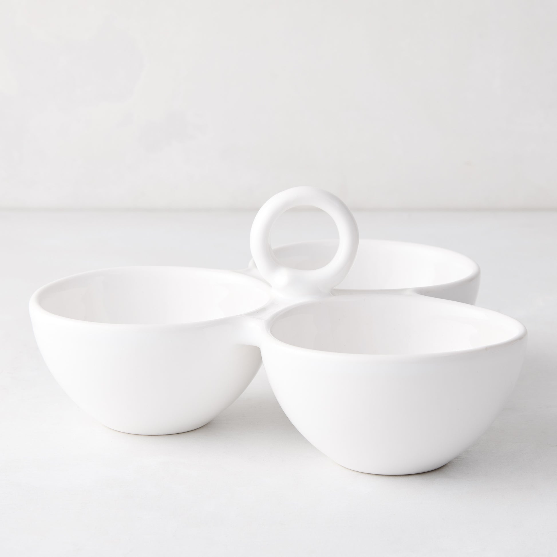 White ceramic triple serve bowl with handle, 9.7"Dia x 2"H.