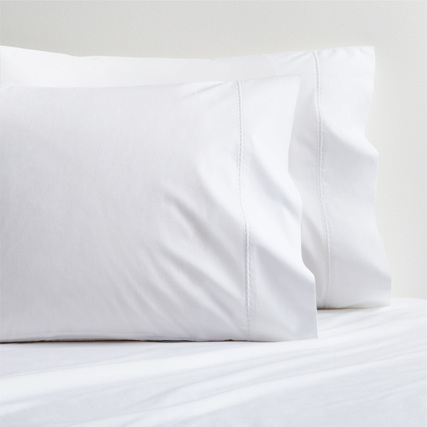 White Diamond Percale Pillowcases, set of 2, made from extra-long staple cotton with a subtle diamond detail.