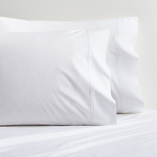 White Diamond Percale Pillowcases, set of 2, made from extra-long staple cotton with a subtle diamond detail.