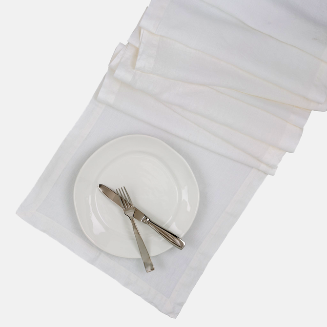 White HG Hand-dyed Linen Table Runner, 18"x108", with mitered corners and a plate setting.