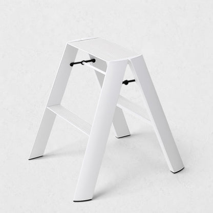 Hudson Grace white Hasegawa Lucano 2-step ladder with a minimalist aluminum and steel design and non-skid feet.
