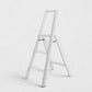 Hudson Grace white Hasegawa Lucano 3-step ladder with a minimalist aluminum and steel design and non-skid feet.