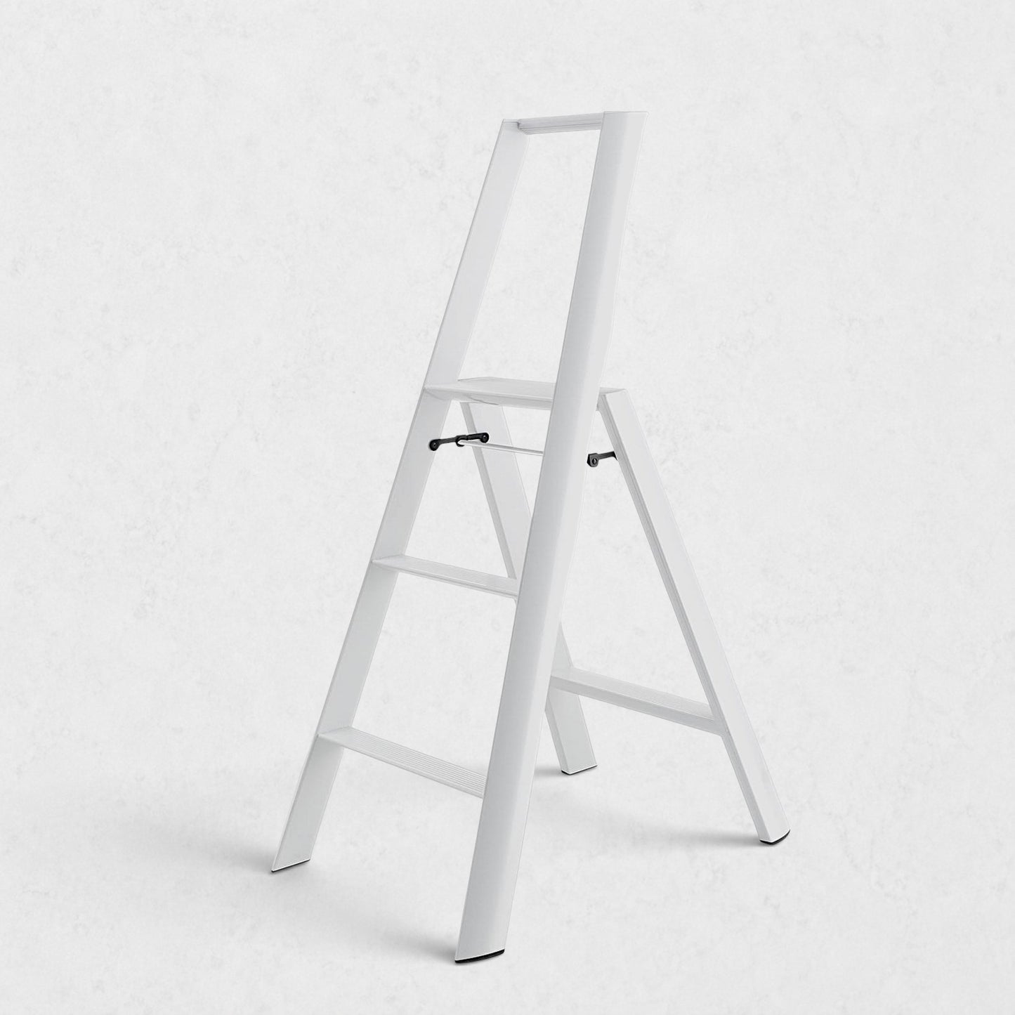 Hudson Grace white Hasegawa Lucano 3-step ladder with a minimalist aluminum and steel design and non-skid feet.
