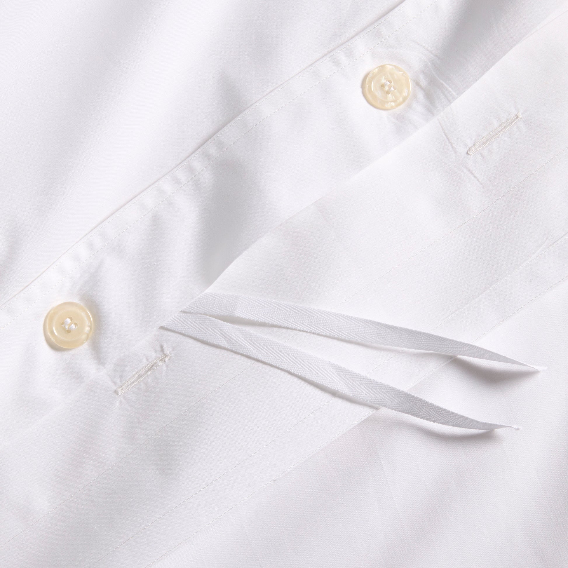 White Italian Percale Duvet Set with button closures and interior ties.