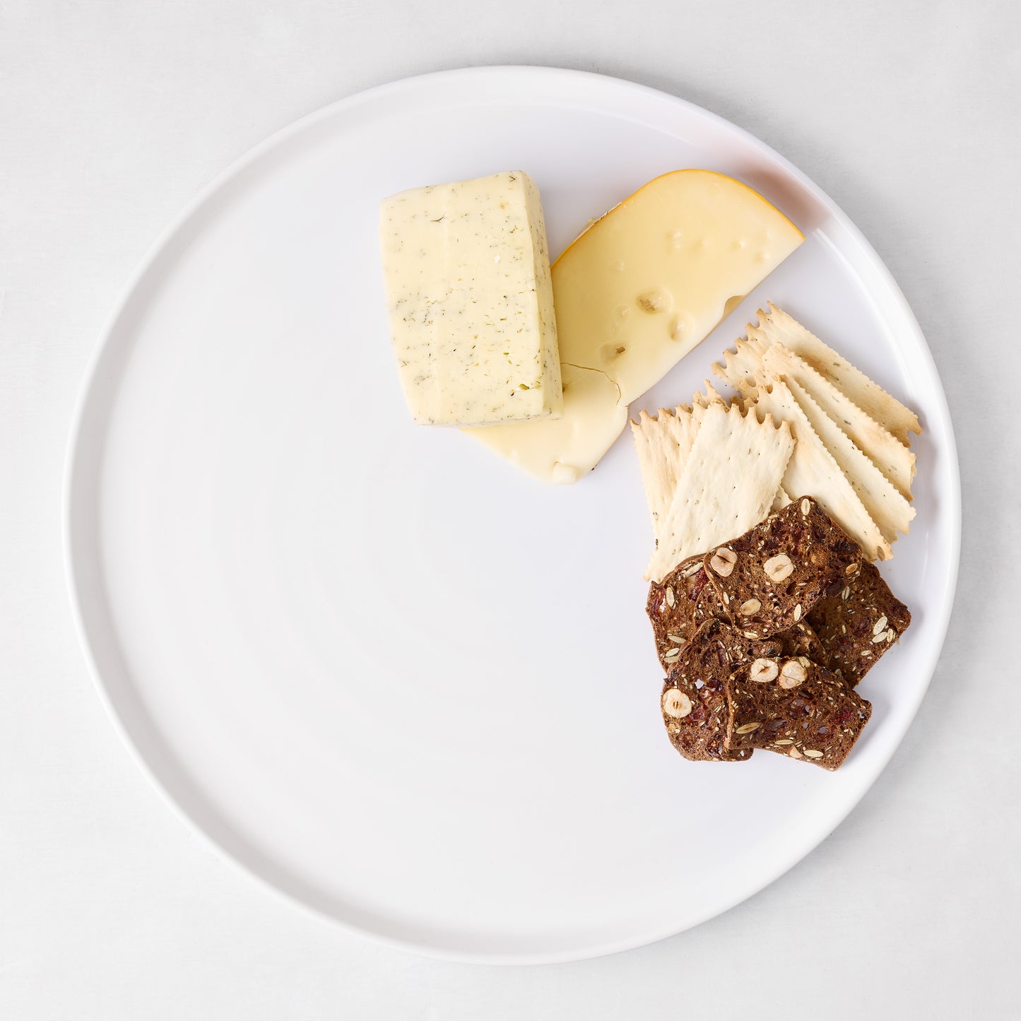 HG White Melamine Serving Platter, 15"Dia, with cheese and crackers.