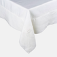 White HG Signature Hand-dyed Linen Tablecloth with generous border and mitered corner detailing.