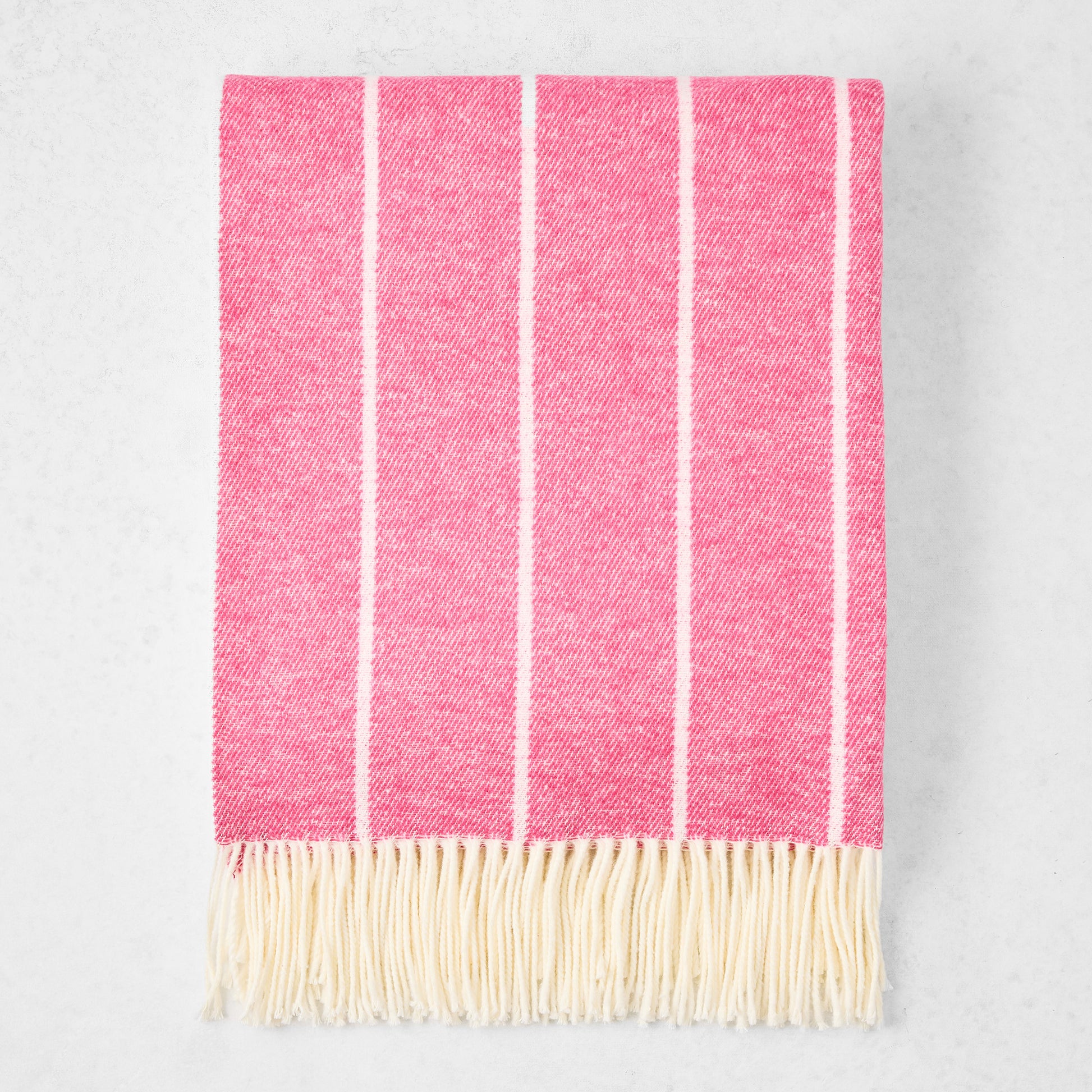 Wild Orchid Pink Fiji Stripe Throw Blanket, 51"W x 67"L, cotton-acrylic blend with fringe.