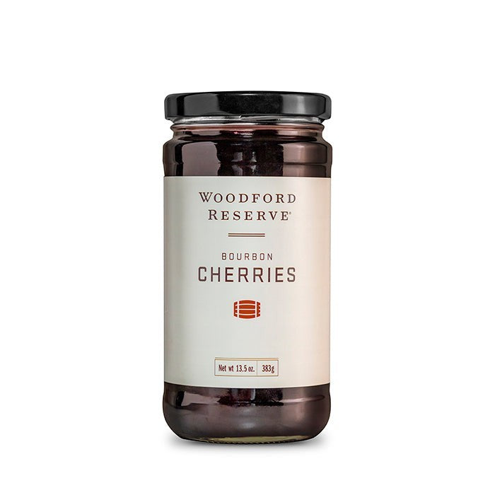 Woodford Reserve Bourbon Cherries in a 13.5oz clear glass jar with a black lid and white label.