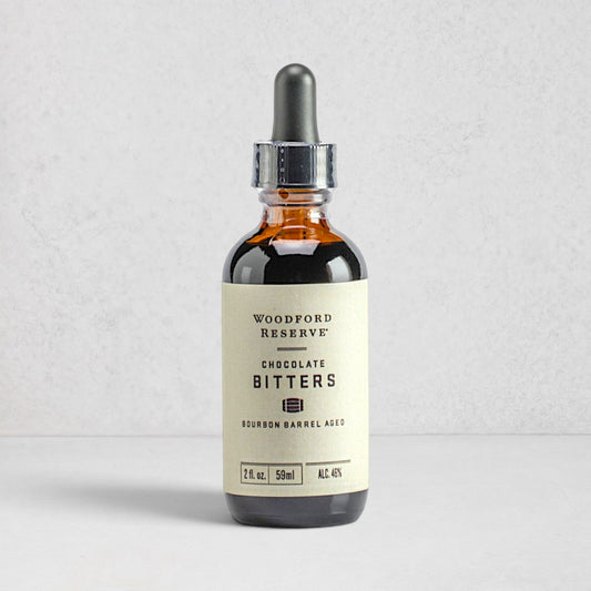 Woodford Reserve Chocolate Bitters, 2 fl. oz. amber glass dropper bottle with a cream label.