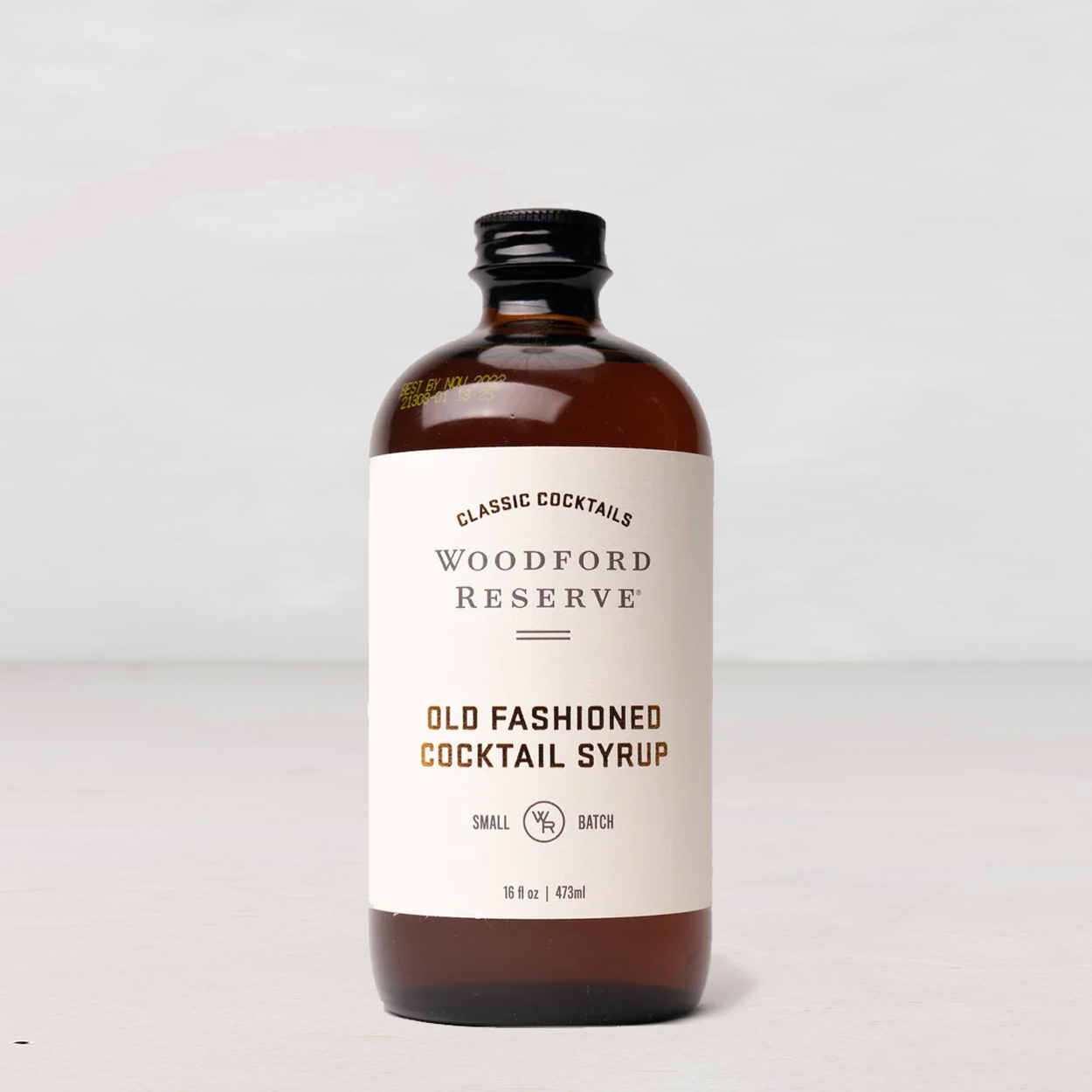 Woodford Reserve Old Fashioned Cocktail Syrup in a 16oz amber glass bottle with a white label.