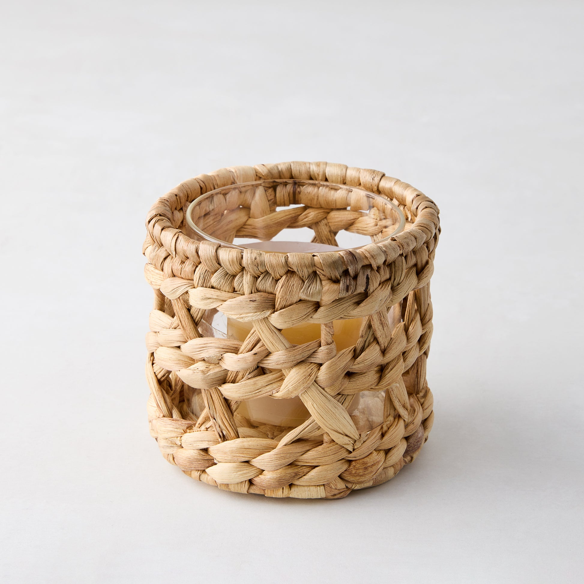 Woven Hyacinth Votive Candle Holder, natural banana bark and glass, 4"Dia x 4"H.