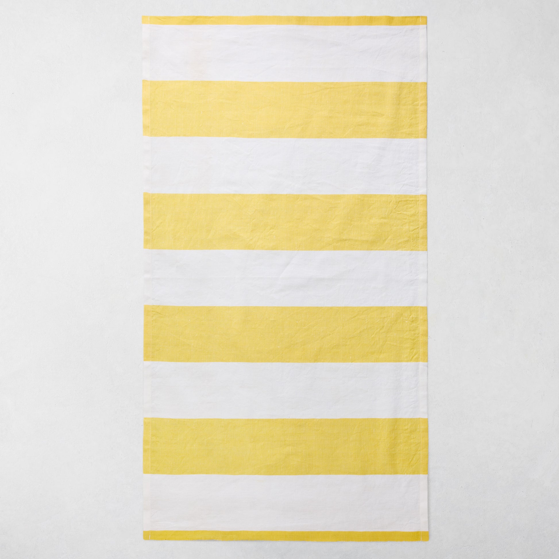 Yellow and white striped cotton-linen hand towel, 20"W x 30"L.