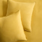 Set of two square yellow European washed linen euro shams with a simple flange edge.