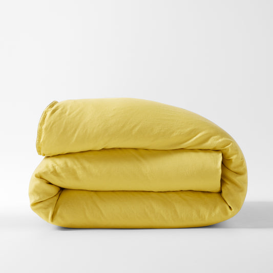 Folded Yellow Washed Linen King Duvet Cover, medium-weight Italian flax linen.