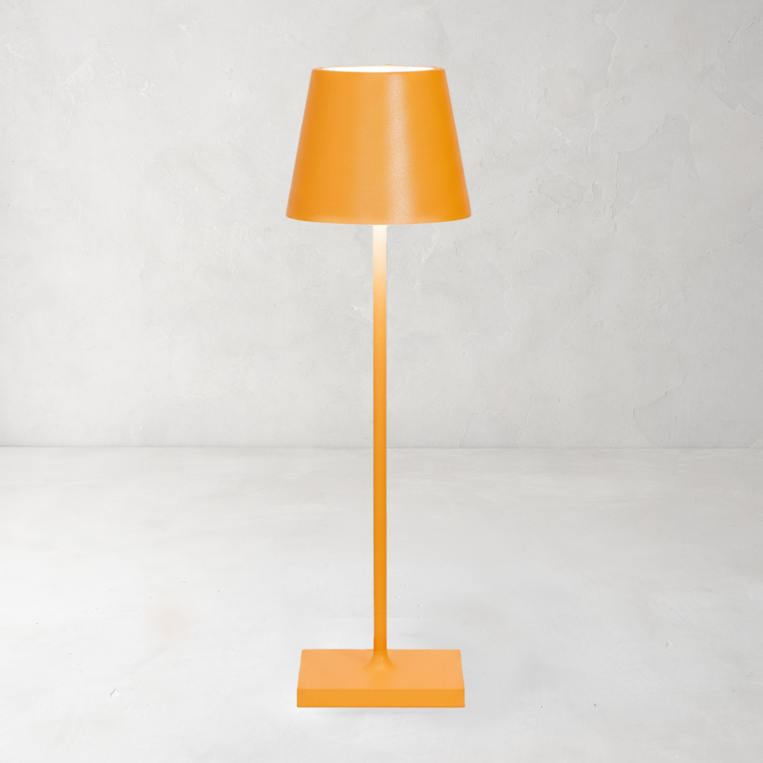 Yellow Poldina Pro rechargeable LED lamp with a modern, sleek, minimalistic design and powdercoat finish.