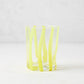 Hand-made Italian double old fashioned glass with vertical yellow stripes.