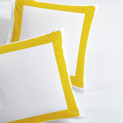 Set of 2 white percale pillow shams with a bold yellow 4-inch wide band border.
