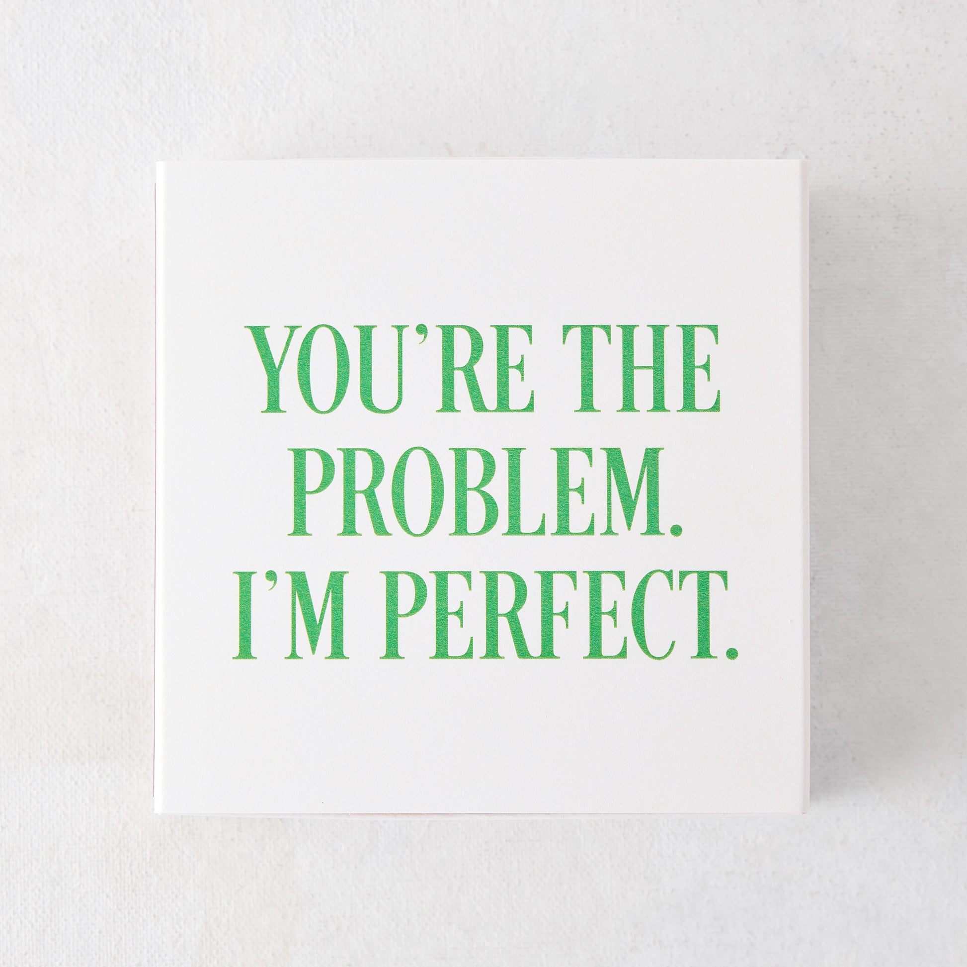 White box of "You're the Problem. I'm Perfect." oversized matches with green text.