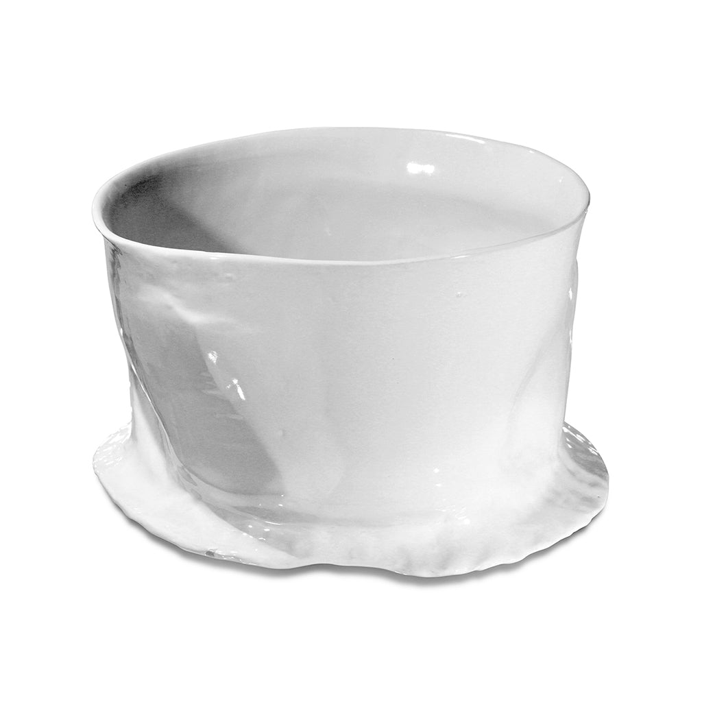 white ceramic pottery bowl with bottom lip