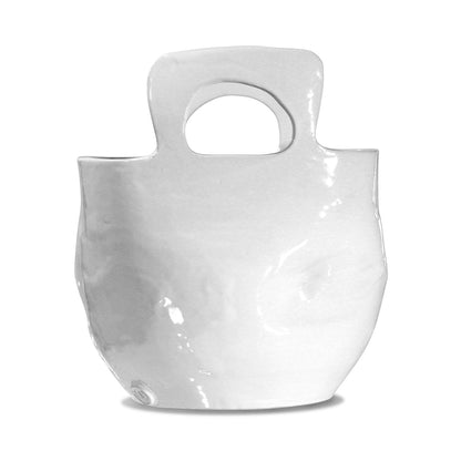 handled white pottery bowl 