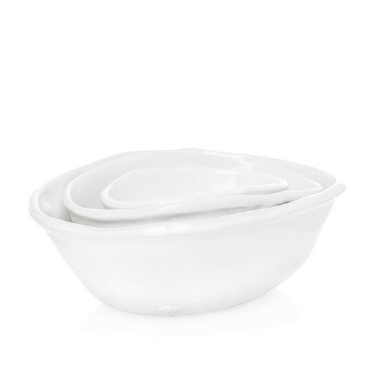 set of three white ceramic bowls
