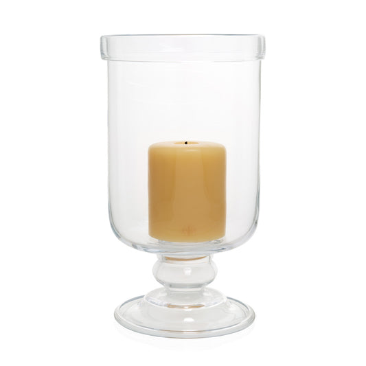 large glass footed candle holder inside outdoor 