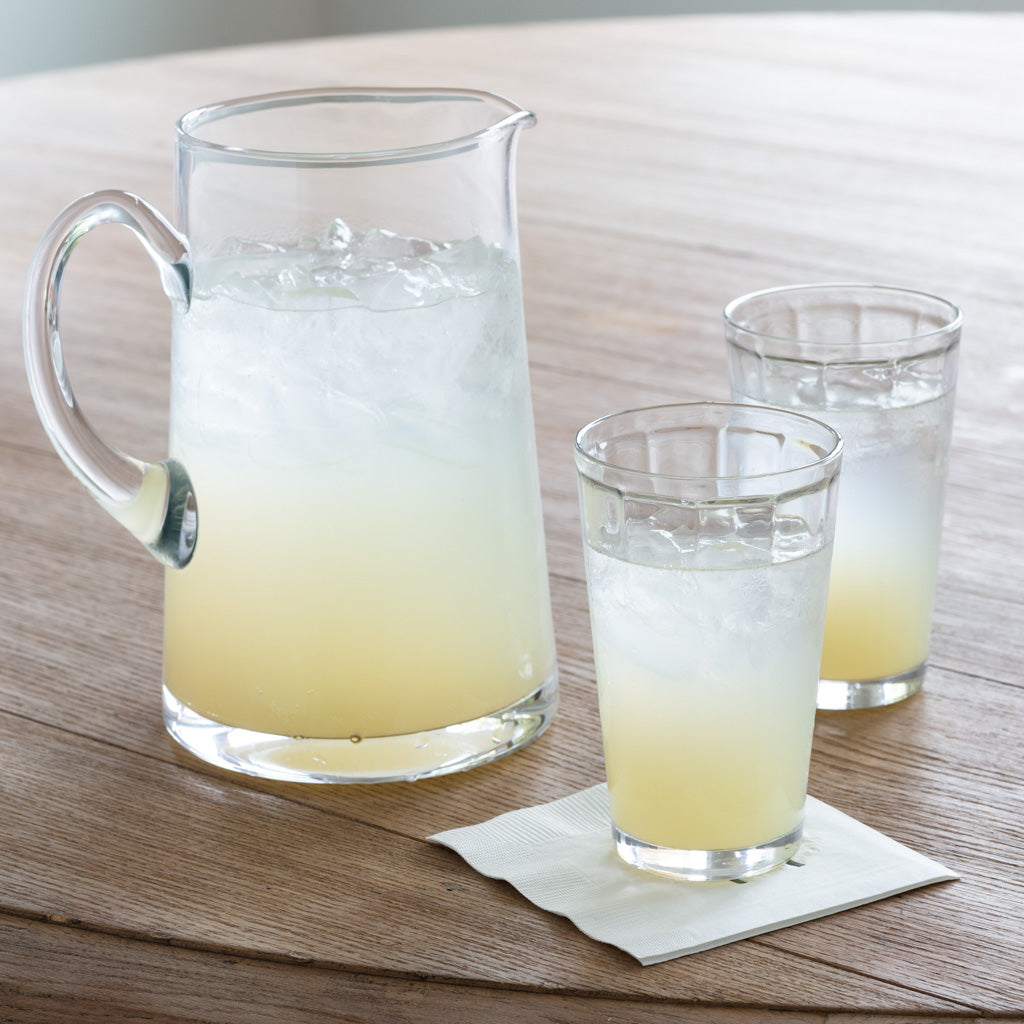 Glass lemonade pitcher with glasses
