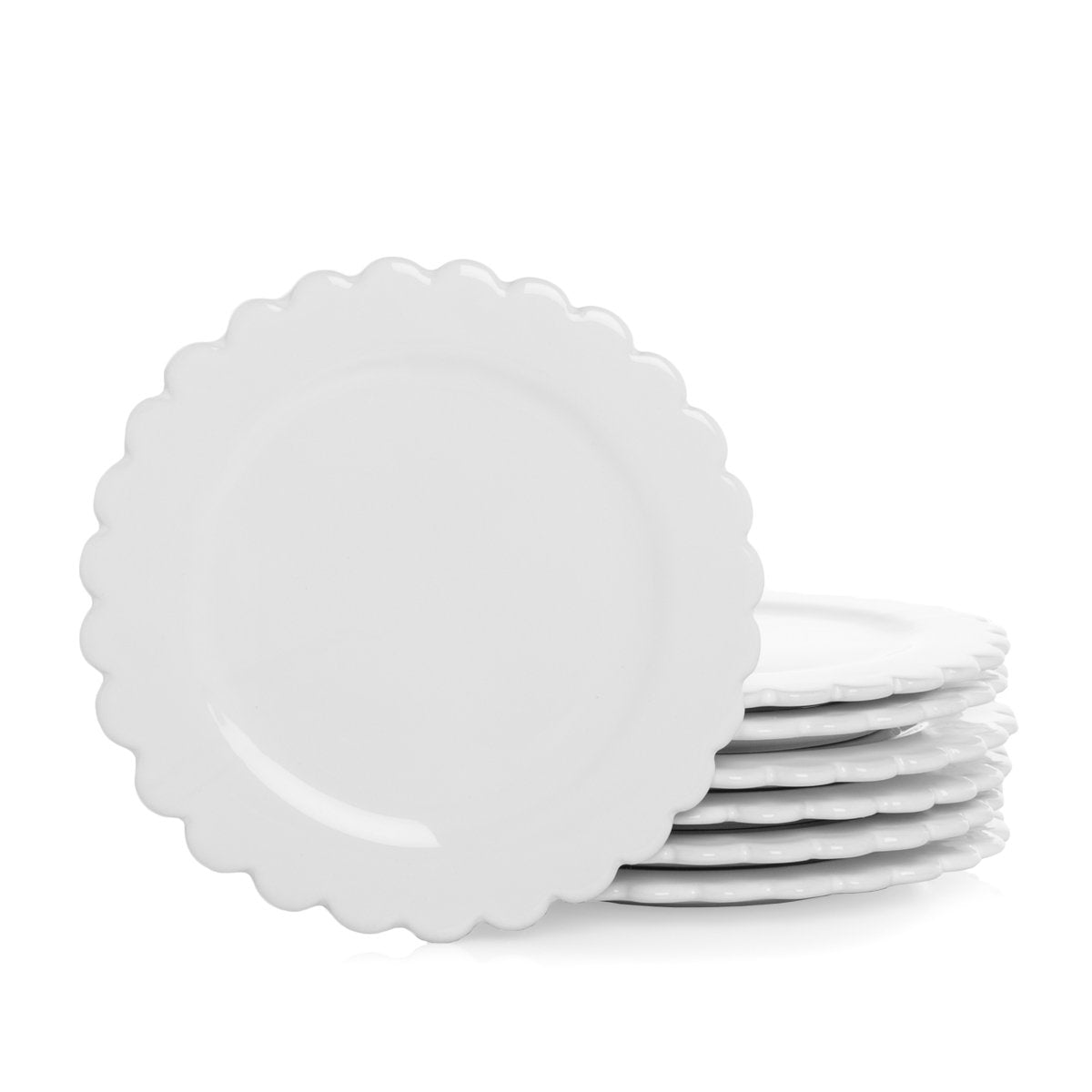 white scalloped salad plate