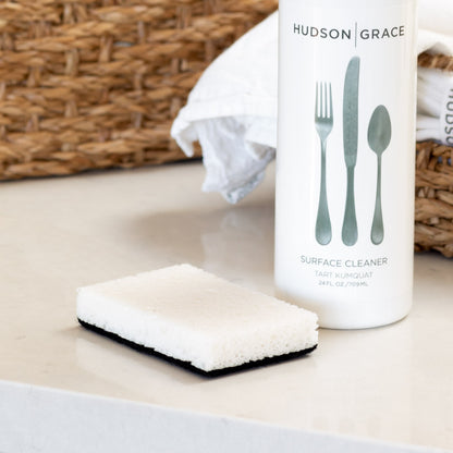 black and white sponge and hudson grace surface cleaner