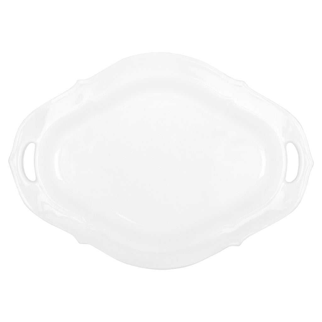 Large white ceramic platter with decorative edges and handles