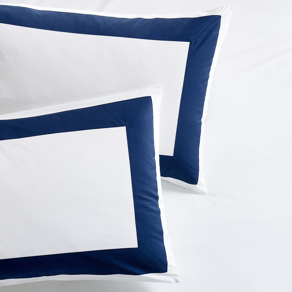navy blue and white wide-band percale pillow shams 