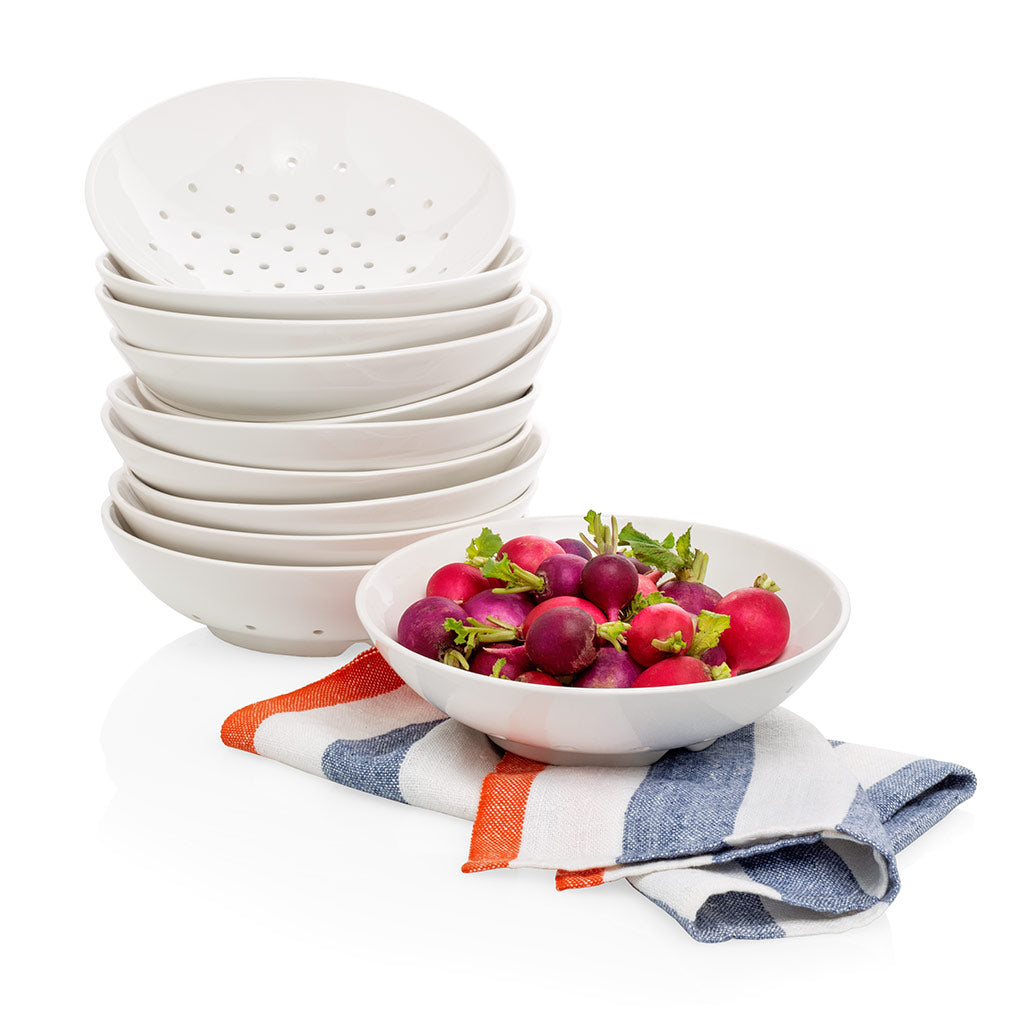 Hudson Grace White Ceramic Berry Bowl with radishes and a striped towel