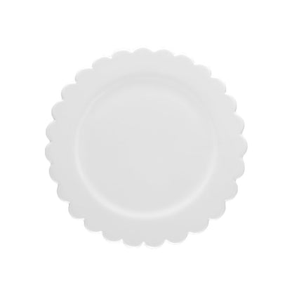 small white ceramic scalloped plate