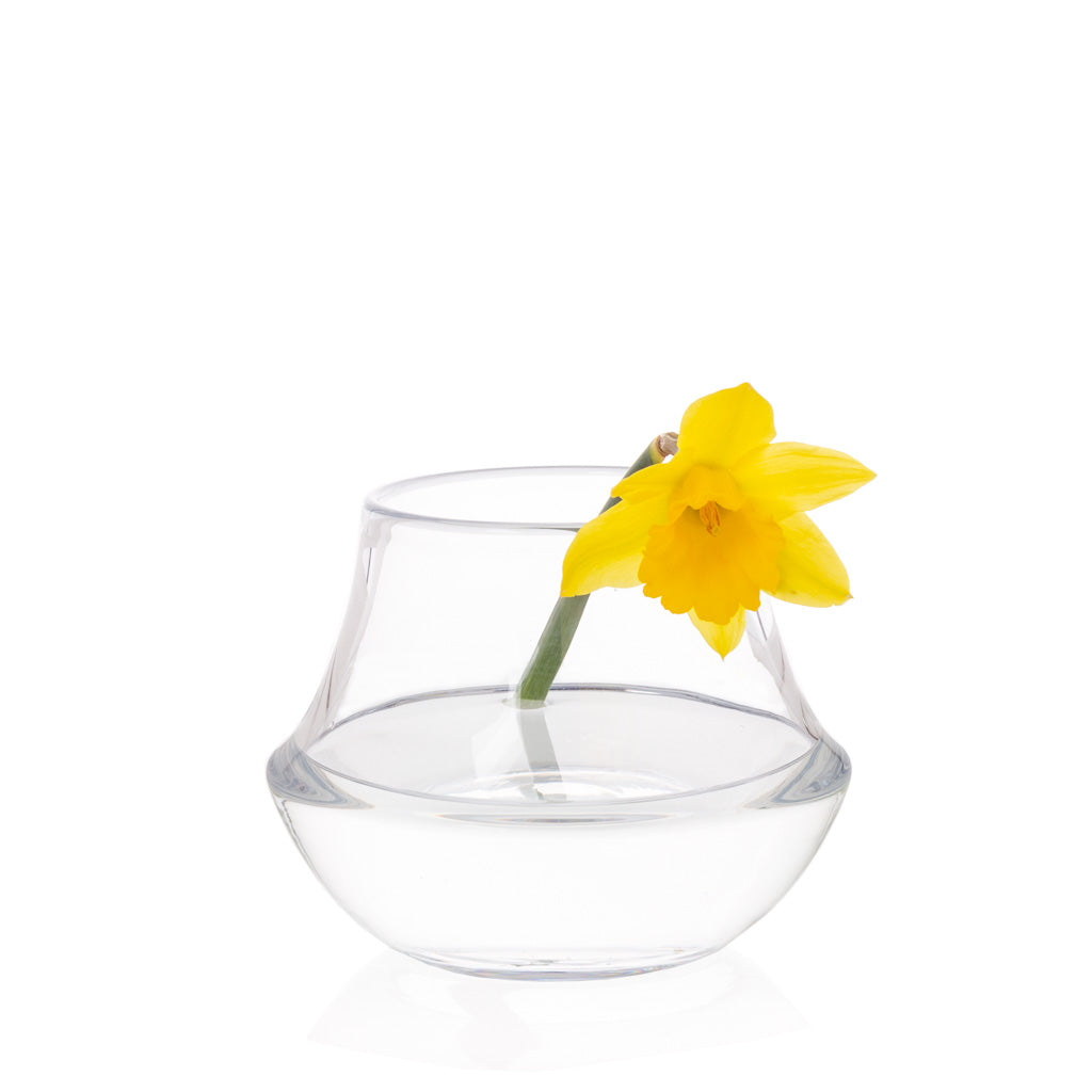 Small glass vase with yellow flower