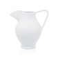Small white ceramic pitcher with large handle