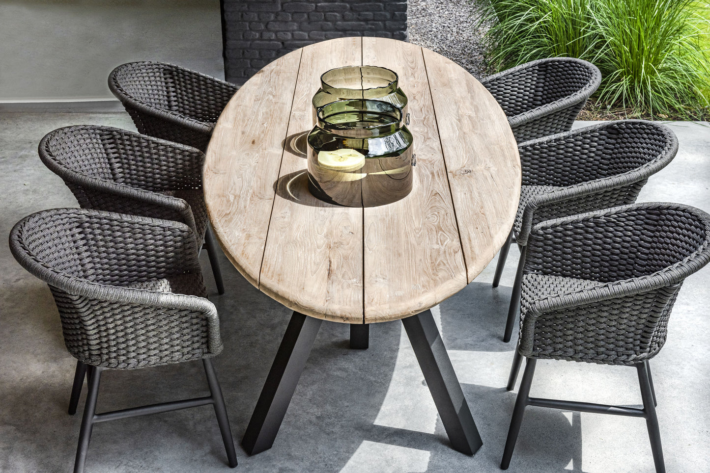 natural oval wooden dining table