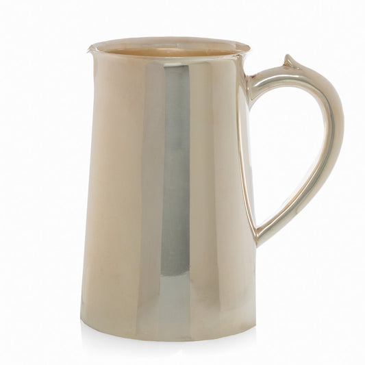 large vintage silver pitcher with decorative handle