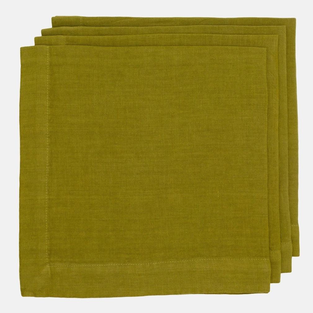 Stack of three Aloe olive green hand-dyed linen napkins, 22-inch square with mitered corners.