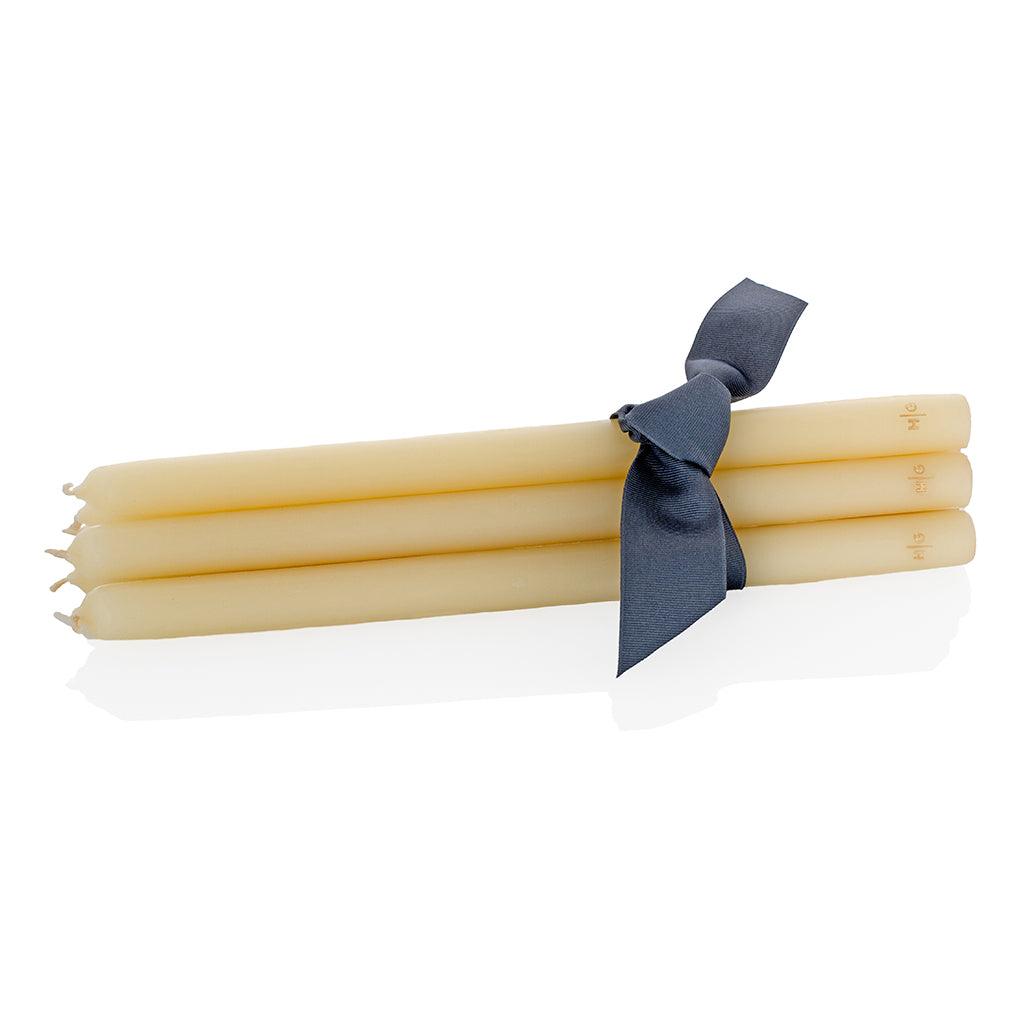 HG Amber Unscented 12" Taper Candle Bundle, set of 5, tied with a gray ribbon.