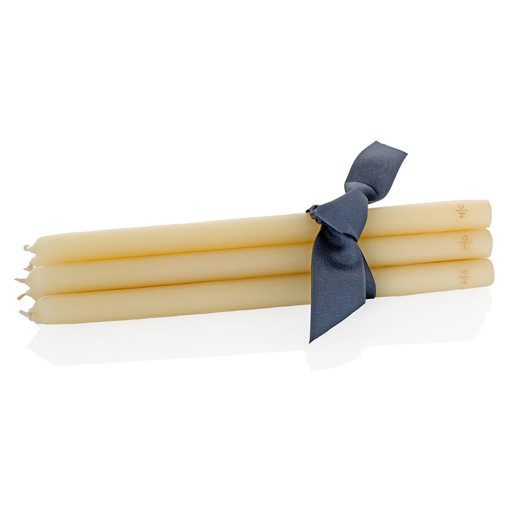HG Amber Unscented 15" Taper Candle Bundle, Set of 5, tied with a gray ribbon.