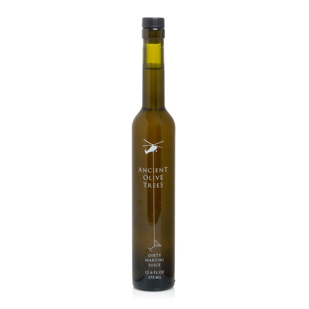 Ancient Olive Trees Dirty Martini Juice in a tall, slender dark green glass bottle with a black cap.