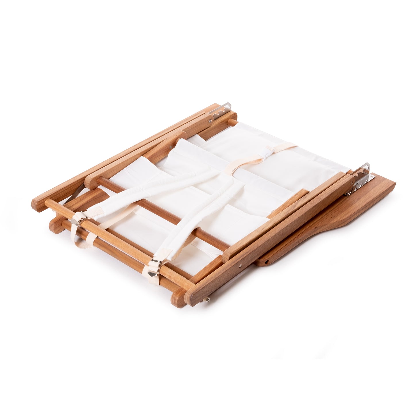 Folded Antique White Reclining Tommy Outdoor Beach Chair with hardwood frame and white canvas.