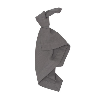 Asphalt HG Signature hand-dyed linen napkin, 22-inch square, tied in a knot.