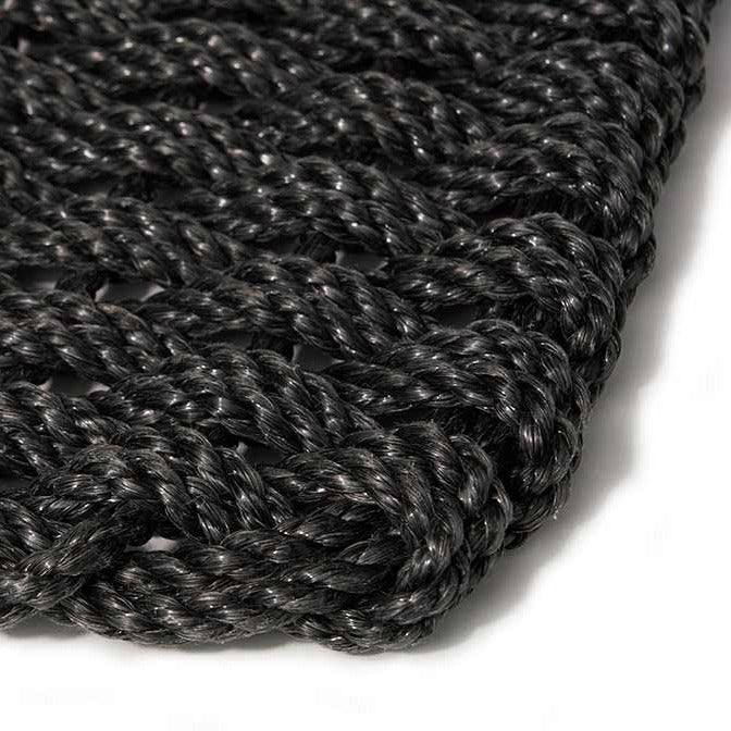 chunky black braided doormat