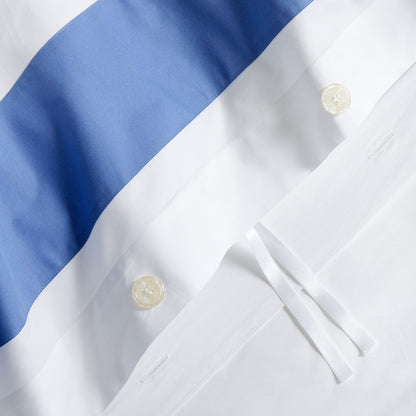 Blue Wide-Band Percale Duvet Cover with white fabric, hidden buttons, and corner ties.