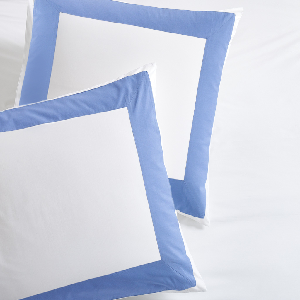 Set of 2 Blue Wide-Band Percale Pillow Shams, white with a 4-inch blue border.